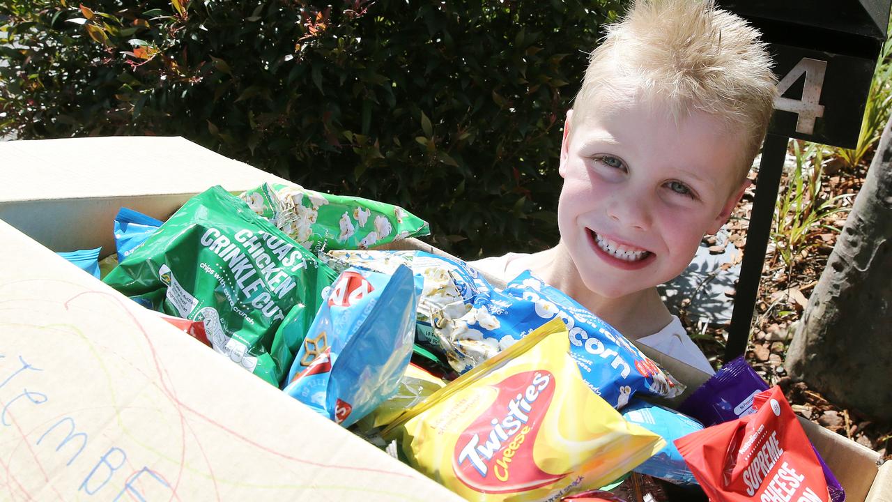 Murrays Beach boy Brodie Porter collecting food for