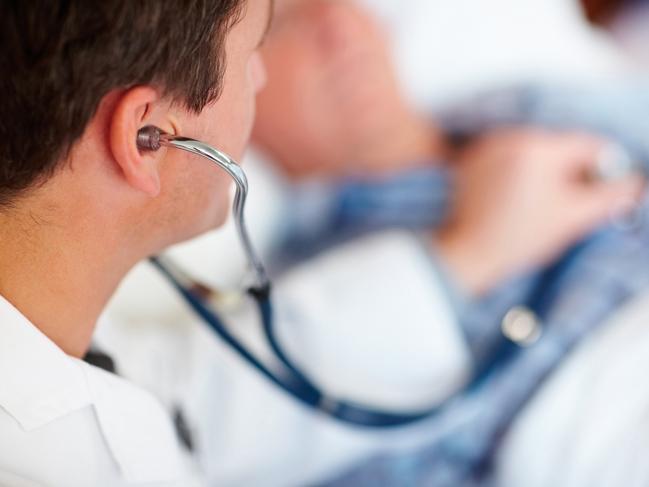 Generic image of a doctor examining a patient's heart beat with a stethoscope.