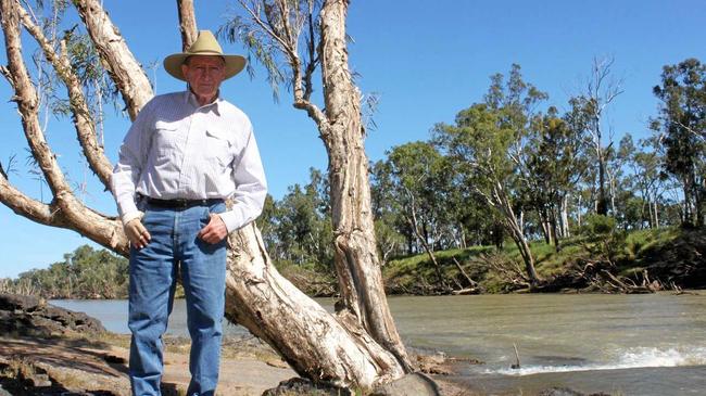 CATTLE BARON: Sir Graham McCamley by the river on Tartrus, where he lived with his wife and established the McCamley cattle empire. Picture: Kathleen Calderwood