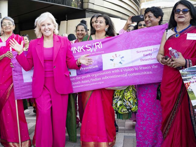 McGrath Foundation Ambassador Tracy Bevan with Pink Parade participants in front of the SCG. Picture: Monique Harmer