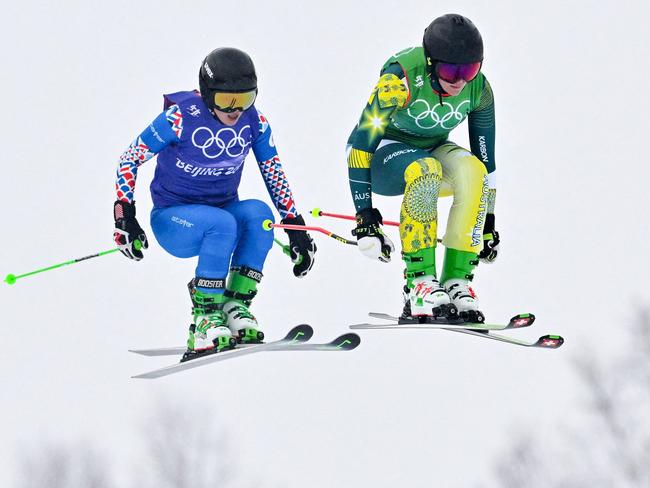 Australia's Sami Kennedy-Sim (right) and Russia's Anastasiia Chirtcova compete in the freestyle skiing women's Ski Cross. Picture: AFP