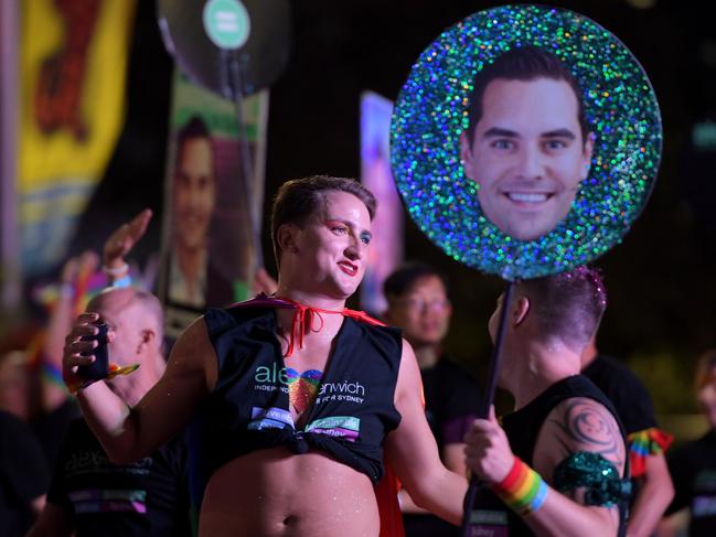 A participant holds up an Alex Greenwich sign at the Sydney Gay and Lesbian Mardi Gras Parade. Picture: Tracey Nearmy