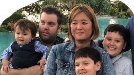 Shaun Reina with his wife and three children