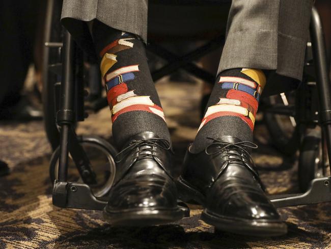 George H.W. Bush wore socks patterned with a book motif to wife Barbara’s funeral in honour of her work promoting literacy. Picture: Paul Morse/Courtesy of Office of George H.W. Bush via AP