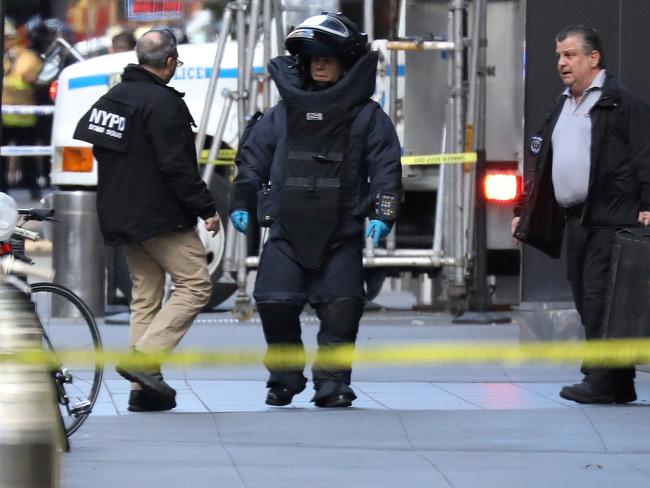 A member of the New York Police Department bomb squad is pictured outside the Time Warner Center in the Manhattan borough of New York City after a suspicious package was found inside the CNN Headquarters in New York, U.S., October 24, 2018. REUTERS/Kevin Coombs - RC159FC48510