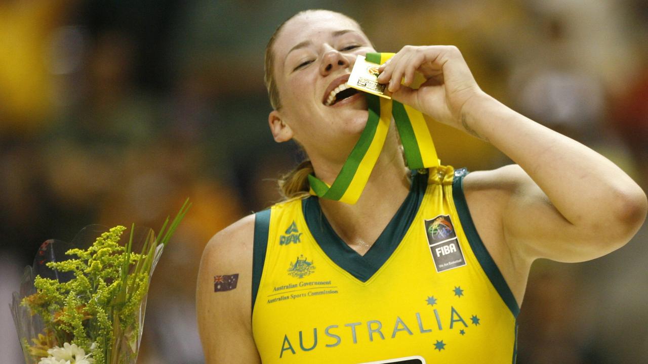 Opals captain Lauren Jackson kisses her gold medal at the 2006 World Championships.