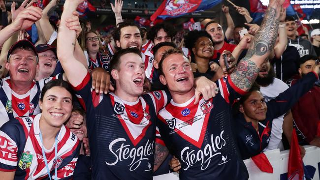 Keary (left) celebrates winning last year’s NRL premiership with Jake Friend. Picture: Getty Images