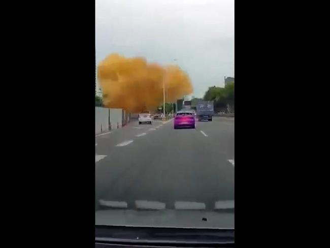 Shocking moment pipe bursts spraying sewage all over the road