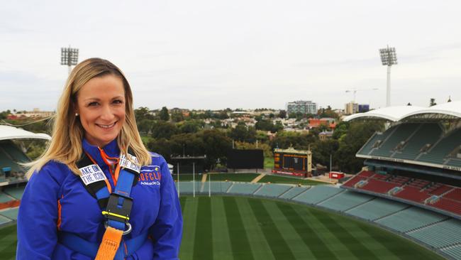 Adelaide Oval major events and tourism manager Laura Robinson on the Adelaide Oval roof climb. Should a new northern grandstand replace the hill, the Moreton Bay figs and the heritage scoreboard? Vote in our poll on this page and have your say below.