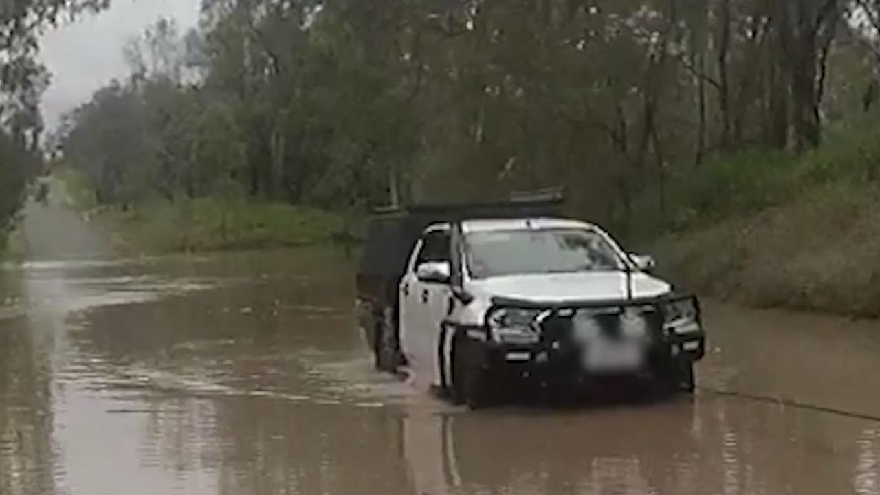 Driver In Car Swept Off Flooded Baralaba-Woorabinda Road | The Courier Mail