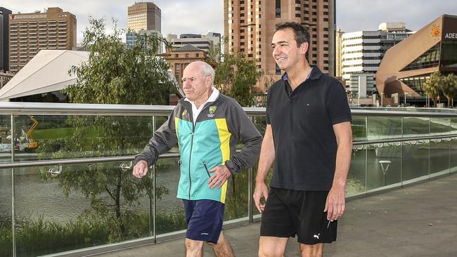 Former PM John Howard and current SA Opposition Leader Steven Marshall walk along the Torrens River. Picture: Mike Burton/AAP