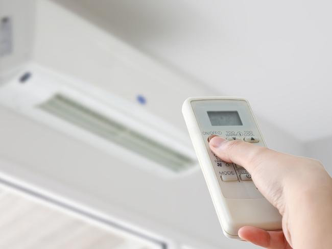 More people are installing aircon but they need to learn a few rules about closing off rooms and letting cool air in ahead of a forecast heatwave to keep a lid on bills. Picture: Courier Mail.