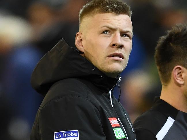 MELBOURNE, AUSTRALIA - SEPTEMBER 06: Jordan De Goey and Levi Greenwood of the Magpies walk off the field during the AFL 1st Qualifying Final match between the Geelong Cats and the Collingwood Magpies at the Melbourne Cricket Ground on September 06, 2019 in Melbourne, Australia. (Photo by Quinn Rooney/Getty Images)