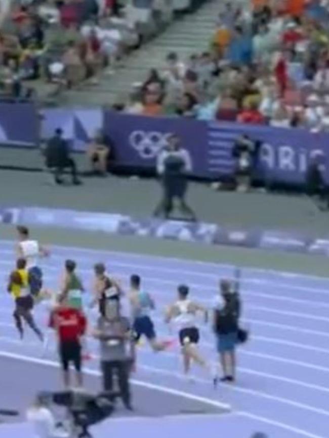 The athletes were forced to run around him. Picture: Nine