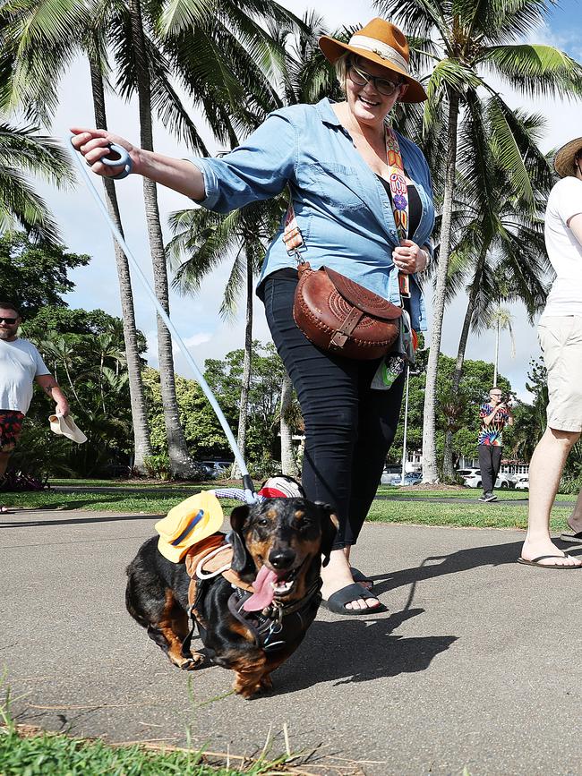 Bec Dent walks her dog Schnitty at the RSPCA's Million Paws Walk fundraiser, held along the Cairns Esplanade. Picture: Brendan Radke