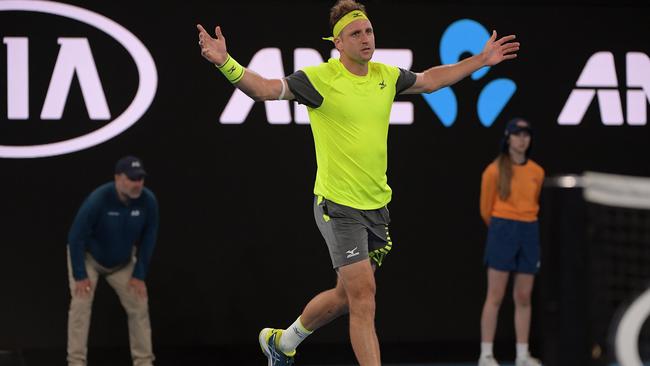 Tennys Sandgren celebrates his win against Dominic Thiem of Austria during round four on day eight. Picture: AAP.