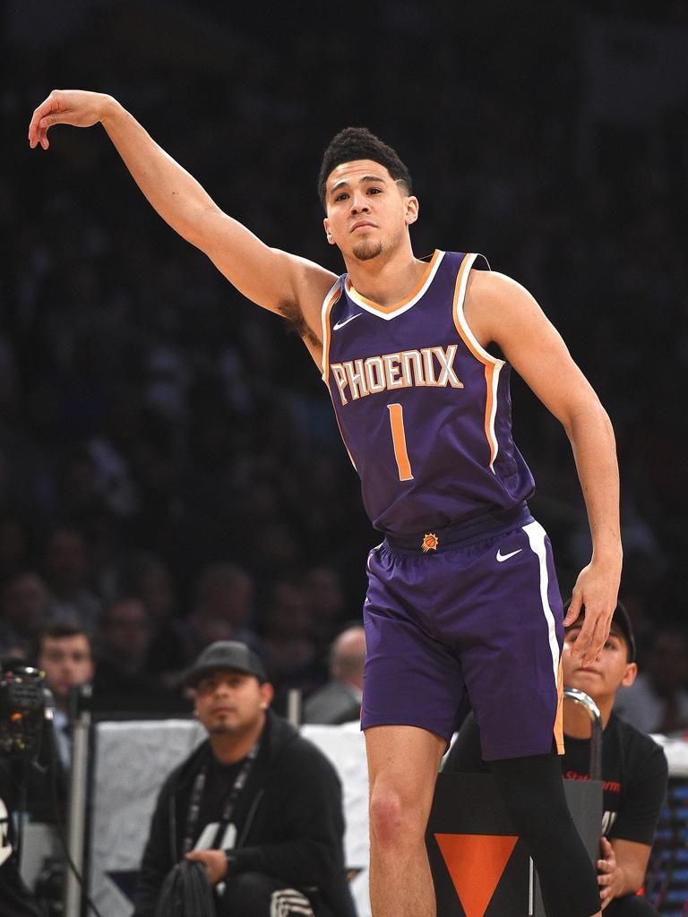 Booker undergoes hand surgery, expected out for 6 weeks