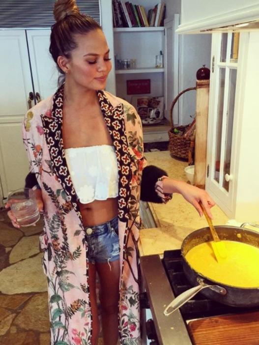 Teigen (taken from @chrissyteigen Instagram) rustles up a feast.