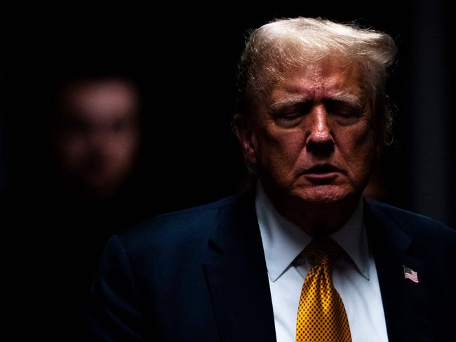 TOPSHOT - Former US President and Republican presidential candidate Donald Trump makes remarks at the end of the day's proceedings during his criminal trial at Manhattan Criminal Court in New York City, on May 29, 2024. Jurors completed opening deliberations on May 29 on whether to convict Donald Trump in the first criminal trial of a former US president -- a decision that could upend the November's election, in which the Republican seeks to return to power. (Photo by Doug Mills / POOL / AFP)