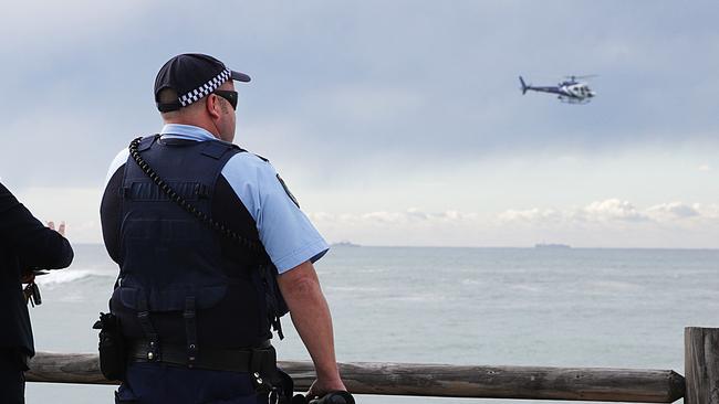 Police, including helicopters, searching for the missing man off Bondi Beach yesterday.