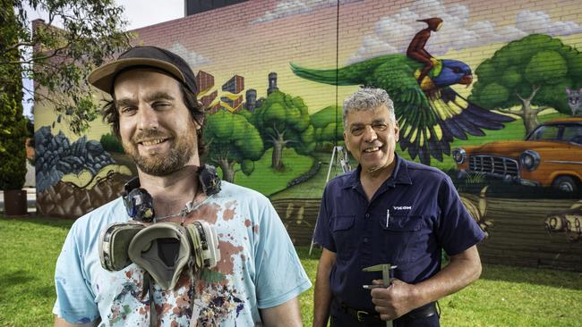 Hayden Dewar (left) and Kon Paraskevakis in front of the mural.