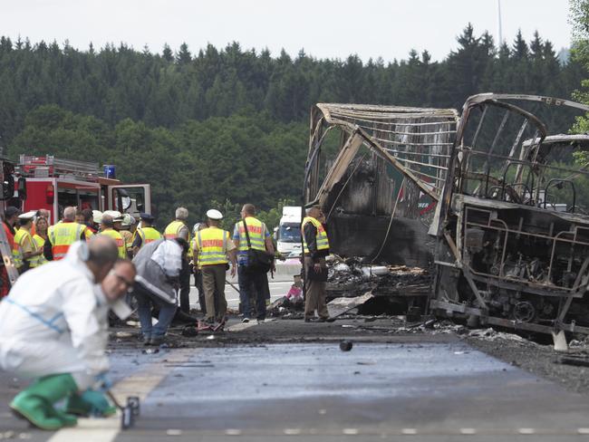 The bus was incinerated, leaving only its metal frame. Picture: AP