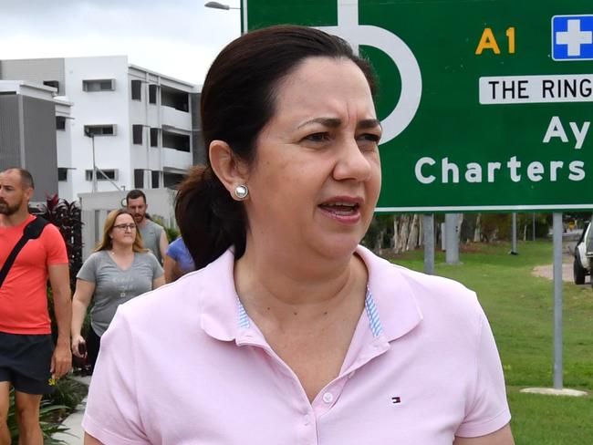 Queensland Premier Annastacia Palaszczuk (left) and Member for Thuringowa, Aaron Harper (right) are seen walking along side Riverside Park in Townsville, Tuesday, October 31, 2017. Premier Palaszczuk was joined on her walk by local ALP politicians, Member for Mundingburra Coralee O'Rourke and Paul Jacob, ALP candidate for the seat of Hinchinbrook. (AAP Image/Darren England) NO ARCHIVING