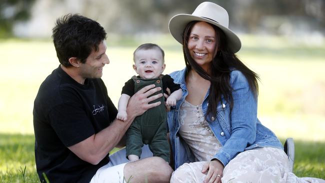 Four-month-old Leo Crandell, pictured with parents Blake and Kellie Crandell has been in lockdown for his short life. Picture: Sam Ruttyn