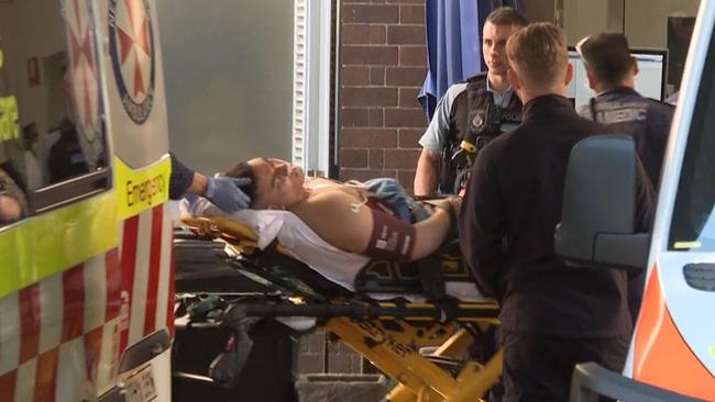 One of the victims as they were rushed to hospital by paramedics. Picture: TNV