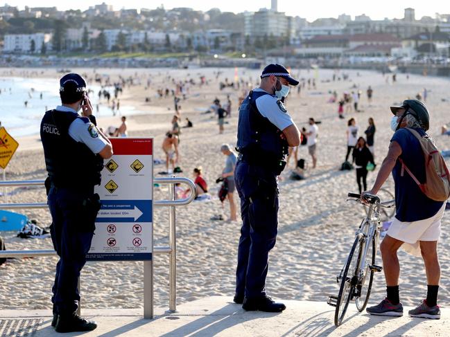 AUGUST 21, 2021: 4.21pm Police pictured at the North end of Bondi Bondi Beach during lockdown.Picture: Damian Shaw