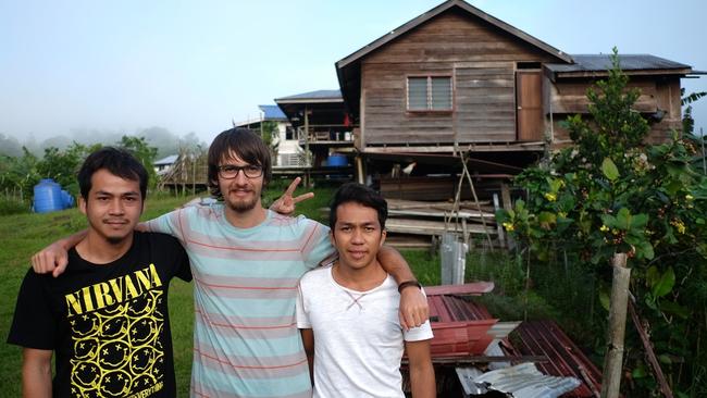 Tasmanian Andrew Gaskell, centre, has been missing in Malaysia for more than a week.