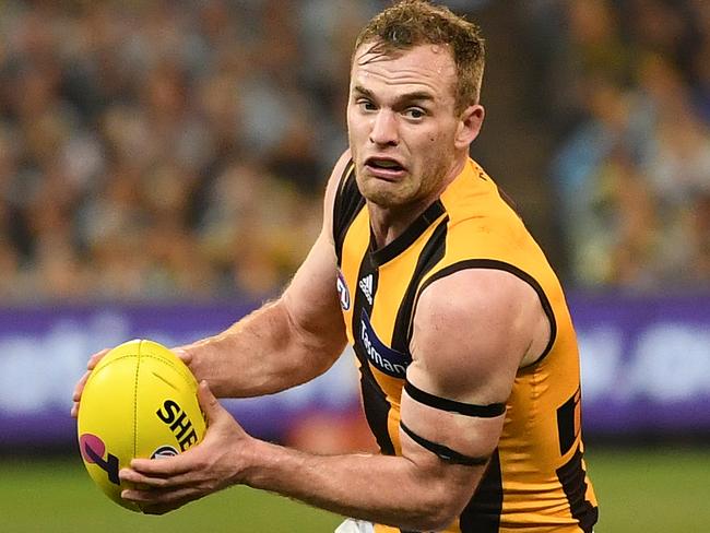 Tom Mitchell of the Hawks (right) and Kane Lambert of the Tigers contest during the First Qualifying Final between the Richmond Tigers and the Hawthorn Hawks in Week 1 of the AFL Finals Series at the MCG in Melbourne, Thursday, September 6, 2018. (AAP Image/Julian Smith) NO ARCHIVING, EDITORIAL USE ONLY