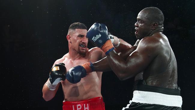 Justis Huni (left) is Australia’s most exciting heavyuweight prospect in years. Picture: Chris Hyde/Getty