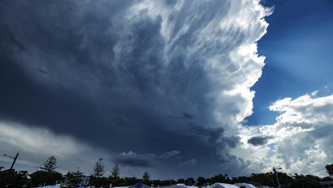 Stormfront approaches over Dicky Beach Caravan Park at Caloundra. Photo Lachie Millard