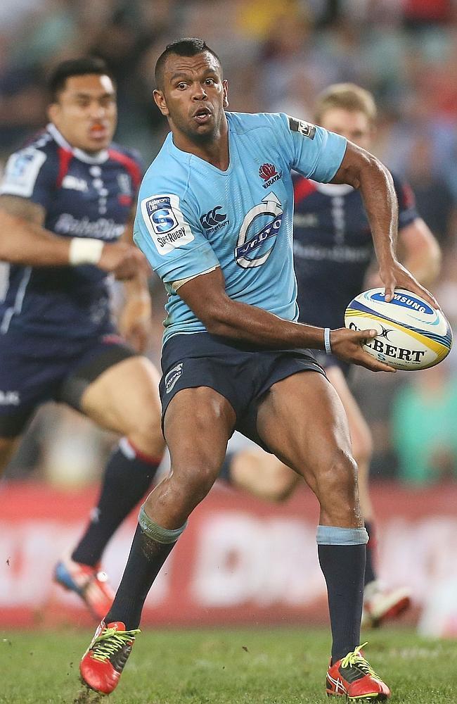 Kurtley Beale shapes to pass against the Rebels.