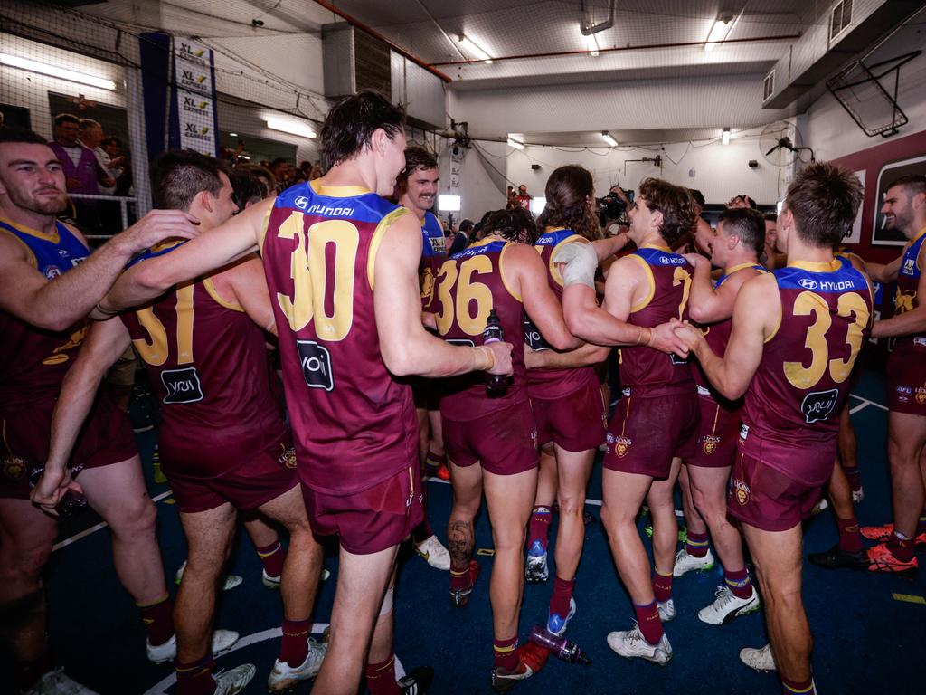 Brisbane Lions players sing the team song after beating Richmond. Picture: Russell Freeman/AFL Photos via Getty Images