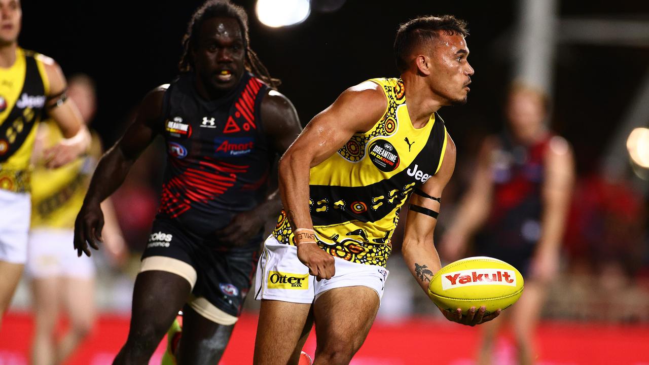 Sydney Stack and former Tiwi Islander Anthony McDonald-Tipungwuti in action in the 2020 Dreamtime in Darwin game.