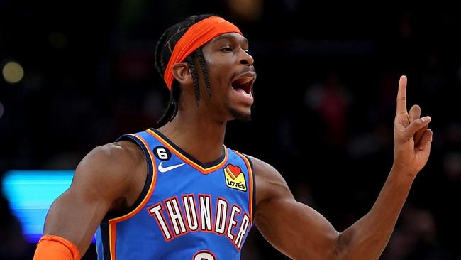 WASHINGTON, DC - NOVEMBER 16: Shai Gilgeous-Alexander #2 of the Oklahoma City Thunder celebrates after hitting the game winning shot against the Washington Wizards at Capital One Arena on November 16, 2022 in Washington, DC. NOTE TO USER: User expressly acknowledges and agrees that, by downloading and or using this photograph, User is consenting to the terms and conditions of the Getty Images License Agreement.   Rob Carr/Getty Images/AFP