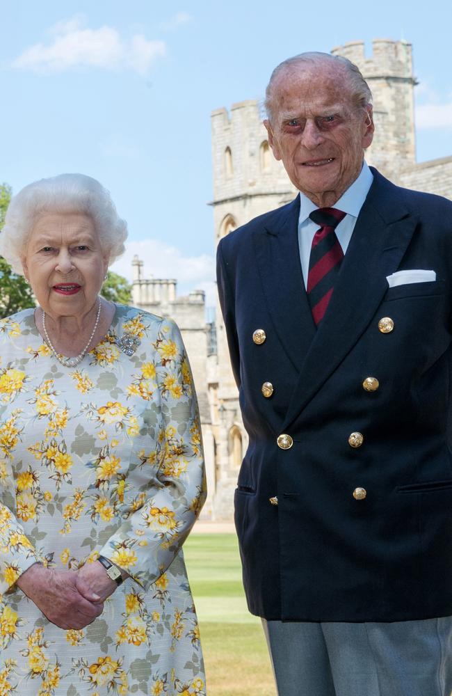 Queen Elizabeth II and the Duke of Edinburgh posed in the quadrangle of Windsor Castle ahead of Philip’s 99th birthday. Picture: Getty Images.