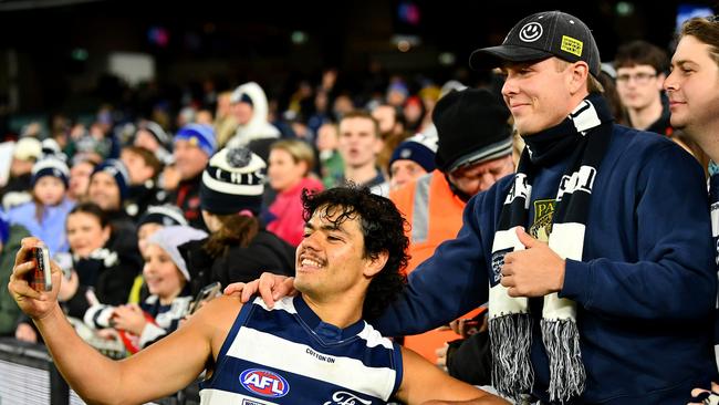 Humphries takes a selfie with fans. Picture: Josh Chadwick/AFL Photos/via Getty Images