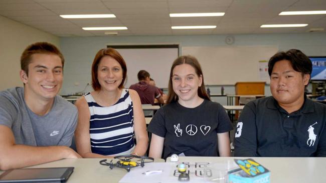 Brandon Waine, Dr Reyna Zipf, Abbey Downing and Juan Miguel focus on STEM education for primary school students. Picture: Jann Houley