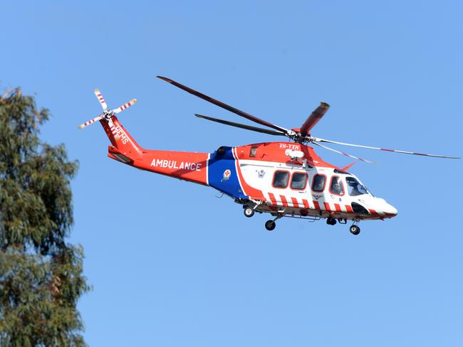 MELBOURNE, AUSTRALIA - NewsWire Photos SEPTEMBER 15, 2020: An Air Ambulance transports a man shot by police after an incident on Hutchinson St Lilydale. It is believed the man lunging at officers with a knife. Picture: NCA NewsWire / Andrew Henshaw