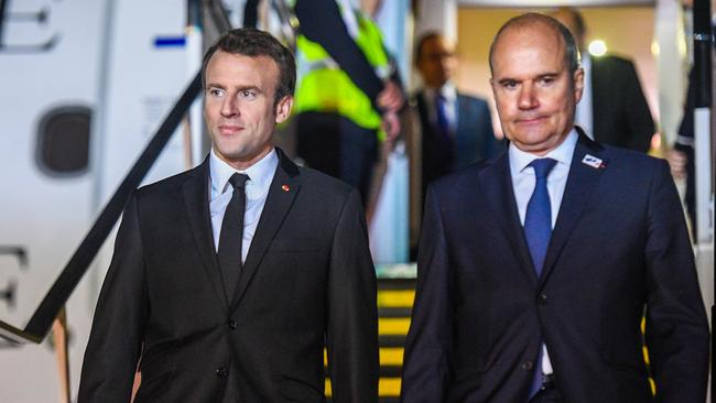 French President Emmanuel Macron is meet by Christophe Penot, the Ambassador of France to Australia at Sydney International Airport. Picture: Brendan Esposito