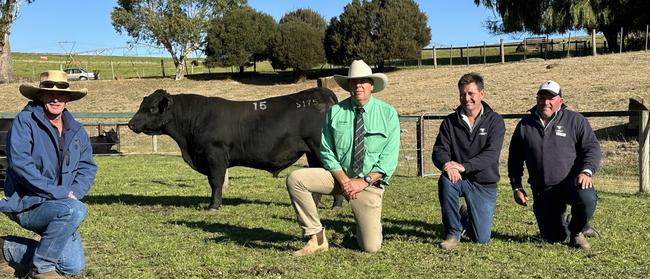 Landfall Angus Stud in Tasmania sold a bull for $240,000. Chris Saunders (pictured) bought the bull on behalf of Dunoon Angus Stud at Holbrook and is pictured with Nutrien auctioneer Warren Johnston and vendors Frank and Ed Archer of Landfall Angus. Picture: Supplied