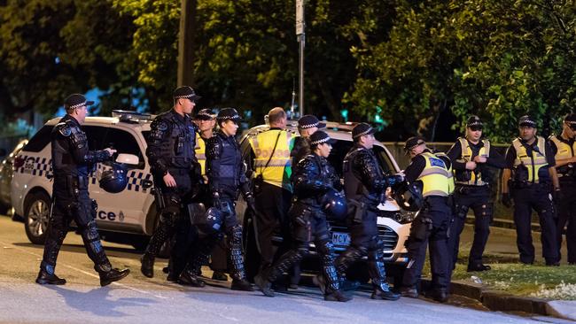 Police prepare to enter the Melbourne Youth Justice Centre in Parkville. Picture: Mark Dadswell