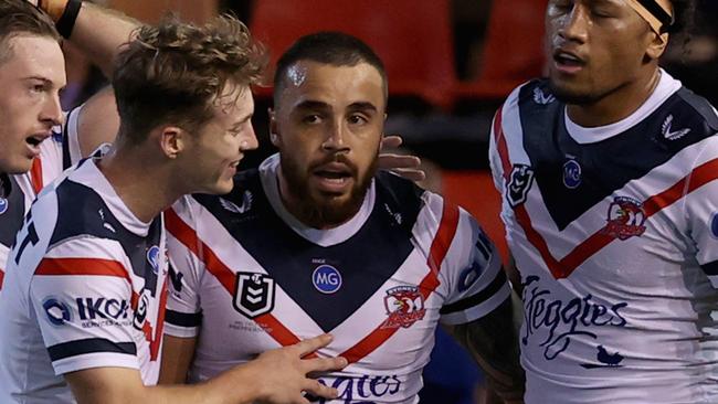 NEWCASTLE, AUSTRALIA - MAY 01: Matt Ikuvalu of the Roosters celebrates his try with team mates during the round eight NRL match between the Newcastle Knights and the Sydney Roosters at McDonald Jones Stadium, on May 01, 2021, in Newcastle, Australia. (Photo by Ashley Feder/Getty Images)