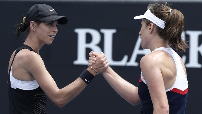 Ajla Tomljanovic and Johanna Konta shake hands after their epic clash. Picture: AP Photo 