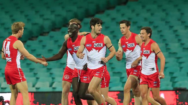 The Swans celebrate a goal during the Round 2 AFL match between the Sydney Swans the Essendon Bombers at the SCG in Sydney, Sunday, June 14, 2020. (AAP Image/Mark Evans) NO ARCHIVING, EDITORIAL USE ONLY