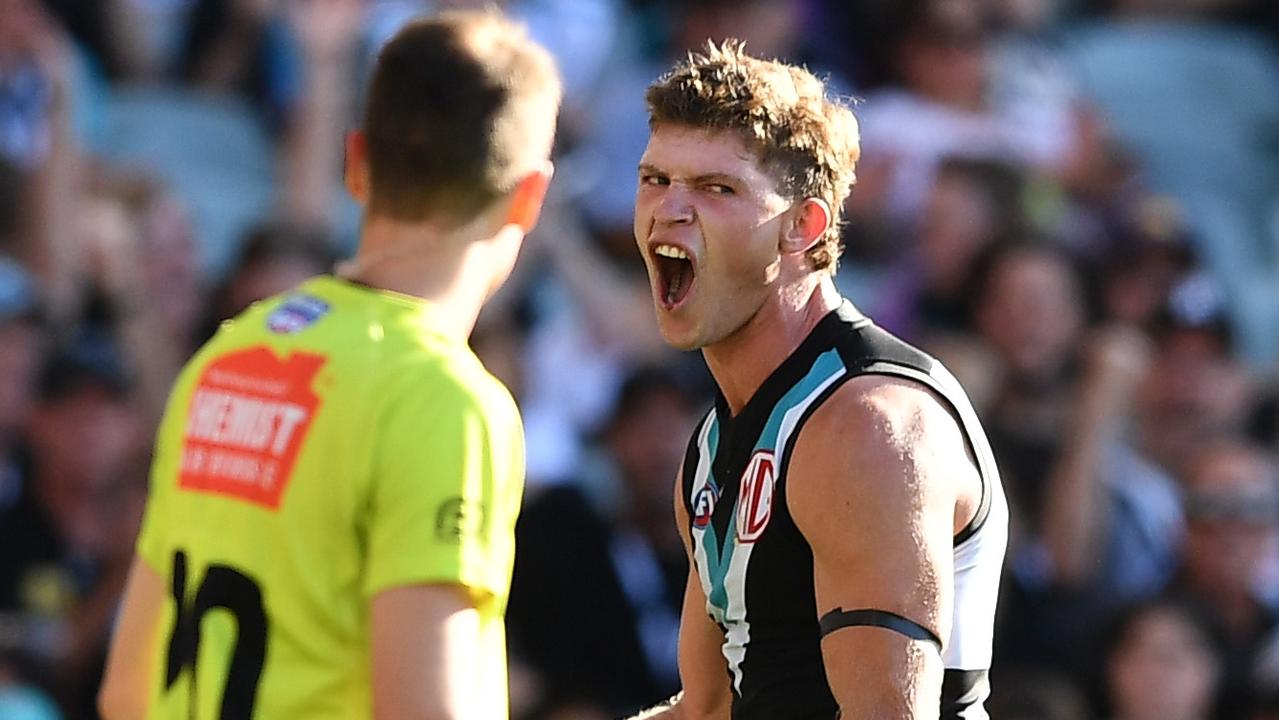 ADELAIDE, AUSTRALIA – MARCH 18: Mitch Georgiades of Port Adelaide celebrates a goal during the round one AFL match between Port Adelaide Power and Brisbane Lions at Adelaide Oval, on March 18, 2023, in Adelaide, Australia. (Photo by Mark Brake/Getty Images)