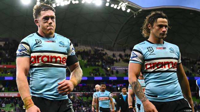 MELBOURNE, AUSTRALIA - SEPTEMBER 14:  Cameron McInnes and Nicho Hynes of the Sharks walk off the field after losing the NRL Qualifying Final match between Melbourne Storm and Cronulla Sharks at AAMI Park on September 14, 2024 in Melbourne, Australia. (Photo by Quinn Rooney/Getty Images)